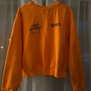 Women’s Orange cropped NASA Sweatshirt, Sz Large (fits like a M) New w/o Tags